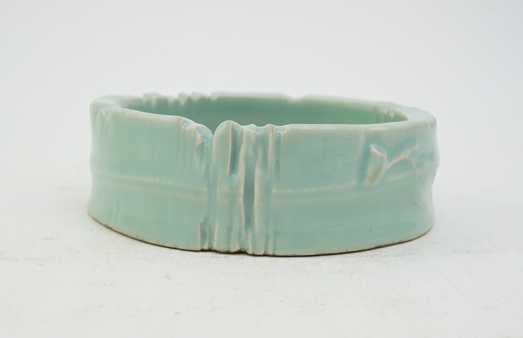 A Chinese celadon glazed brushwasher, Qianlong mark but later